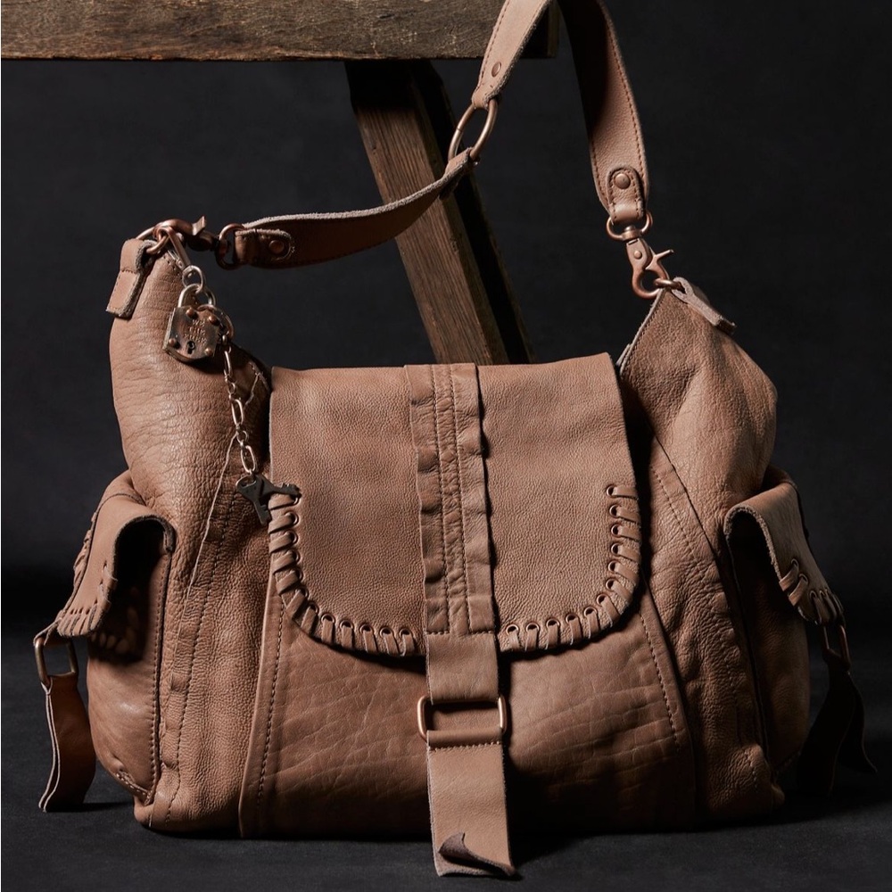 Free people We the Free Leigh distressed tote and bag charm, retail $168